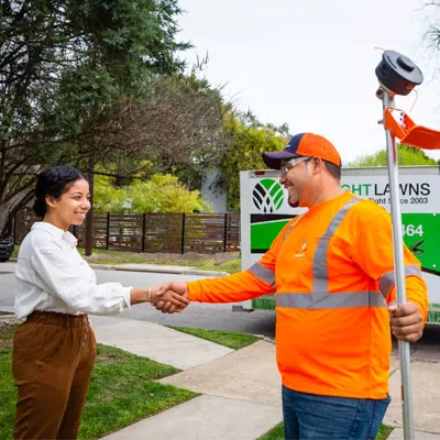 employee shaking hands with customer