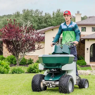 riding-seeder-on-lawn